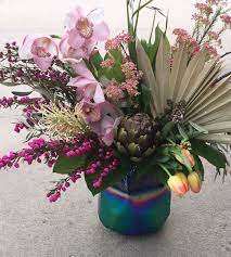 As a top rated local loveland, colorado florist we are excited to bring custom designs for any occasion. Cymbidium Orchids Dried Fan Palm Beautiful Vase Flower Delivery Amazing Flowers Unique Flower Arrangements