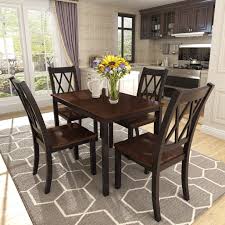 This product is the perfect solution for small kitchens or dining spaces. 5 Piece Dining Table Set Modern Wooden Kitchen Table And Chairs With Solid Wood Legs Dining Table With Chairs For Dining Room Restaurant Coffee Shop Small Spaces Breakfast Furniture Black W5955