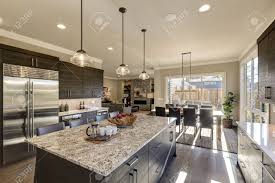 Deciding on warm or cool tones in your color palette is an essential first step. Modern Gray Kitchen Features Dark Gray Cabinetry Paired With Stock Photo Picture And Royalty Free Image Image 70156806