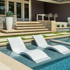Relaxing On These In Pool Chaises Is The Perfect Way To Spend The Afternoon Pool Chaise Ledge Lounger Tanning Ledge Pool