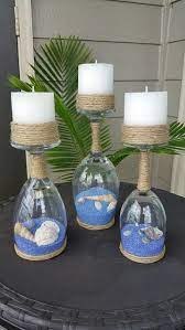 Inside wine glasses are colored sand and real seashells. Seashell And Sand Wine Glass Candle Holders Set Of 3 Wine Glass Crafts Wine Glass Candle Holder Wine Glass Candle