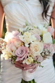 Burlap wrap with vintage buttons looks rustic and very chic. 480 Pastel Wedding Flowers Ideas Wedding Flowers Pastel Wedding Wedding