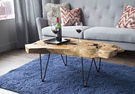 Rough sawn red oak coffee table with integrated sapele splines, red oak pegs, sapele battens and 12 steel hairpin leg hardware. Natura Hairpin Coffee Table Ballam Furniture Gallery