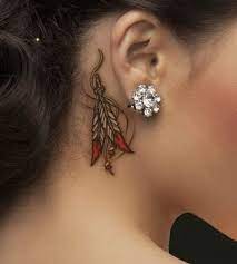 Behind the ear tattoos are highly popular among girls. 60 Pretty Designs Of Ear Tattoos 2017 Tattoos Indian Feather Tattoos Ribbon Tattoos
