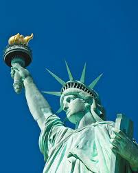 The statue of liberty 's home is bedloe's island (renamed liberty island in 1956). The Story Behind The New Colossus Poem On The Statue Of Liberty And How It Became A Symbol Of Immigration Abc News