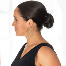 To transition the low bun from day to night, lopez begins by taking down the bun and brushing the hair. Low Bun Beauty Photos Trends News Allure