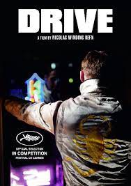 Drive is a 2011 american action drama film directed by nicolas winding refn.the screenplay, written by hossein amini, is based on james sallis's 2005 novel of the same name.the film stars ryan gosling as an unnamed hollywood stunt driver who moonlights as a getaway driver.he quickly grows fond of his neighbor, irene (carey mulligan), and her young son, benicio. Drive Review Movie Laff 2011