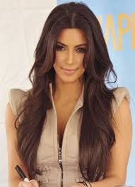 See how to get it: Kim Kardashian Medium Brown Hair Novocom Top
