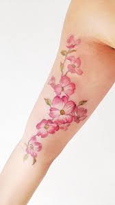 Cherry blossom is a symbol of female beauty and sexuality. Danity Cherry Blossom Tattoos And Their Meaning Cherry Blossom Tattoo Tattoos For Women Flowers Blossom Tattoo