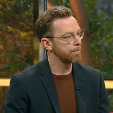 Først mange år efter, at han så den lille pige i trillebøren, brød han  sammen i bilen