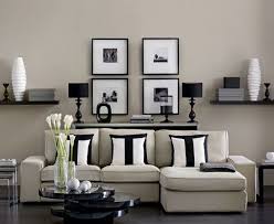 Cream is the perfect shade for bright and airy living rooms in period homes, especially if you're lucky enough to have windows big enough to enhance natural light. Black Tan Room Tan Living Room Monochrome Living Room Living Room Inspiration