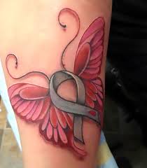 Breast cancer with angel wings tattoo on leg. Pink Breast Cancer Butterfly Tattoo Idea