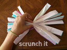 Grab small amounts of pom in your hand. Diy Cheerleading Pom Poms 7 Steps With Pictures Instructables