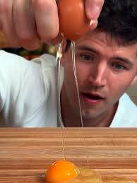 One Hand Cracking Egg