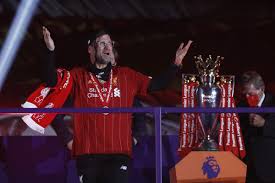 Jordan henderson does funny shuffle as liverpool players lift premier league trophy for first time in stunning anfield light show in front of legend kenny dalglish by jackson cole 23rd july 2020. Jurgen Klopp Hails Special Liverpool Team After Lifting Premier League Trophy