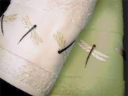 Dragonfly towel collection features solid white ribbed towel with light tan embroidered border along with embroidered dragonflies. Dragonfly Towels Dragonfly Decor Dragonfly Dragonfly Wall Art