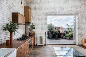 Hunker made a chic, monochromatic kitchen even nicer with the addition of some gold hardware. Nouvelle Cuisine Seven Modern Kitchen Design Ideas