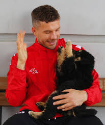 This professional football player was playing as a forward for. Lukas Podolski Com On Twitter High Five Friends Dog Cute Poldi