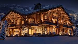 Le salon cosy, composé de canapés et fauteuils. Projet Immobilier Megeve Construction De Luxe Chalet Sur Piste Luxury Chalet In Megeve Chalet De Luxe Maison D Hiver Design De Chalet