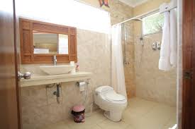 Featured amenities include dry cleaning/laundry services, laundry facilities, and a library. Villa Agung Beach Inn Bali Com