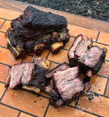rotisserie smoked short ribs over the