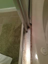 Just wiping the glass down with a cloth is. Same Tub Not Clean Mold And Rust On The Sliding Glass Door On Shower Bath Picture Of The Beach Club Resort Spa Gulf Shores Tripadvisor
