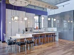 If you want a breakfast bar—an overhang ideal for enjoying simple meals and snacks—make sure that bar stools have at least two feet of clearance for access and comfort. Oversized Modern Kitchen Island With Table Height Counter Hgtv