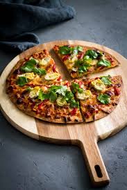 Cauliflower Crust Pizza With Artichokes And Roasted Red Pepper In A Wooden Board Spoonabilities Com Stuffed Peppers Recipes Pizza Crust