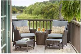 Teak and wicker are similar materials with a sealed construction that is lightweight, repels moisture and is easy to move. 5 Piece Patio Wicker Furniture Conversation Set 2 Chairs 2 Ottomans 1 Sidetable Conversation Set Patio Patio Seating Sets Patio Set