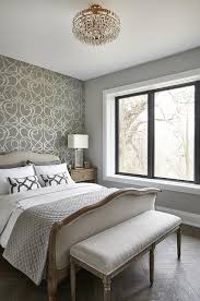 The headboard pops off of it even more than with the lighter color and that gray wall is beautiful. Silver And Gray Wallpapered Accent Wall Design Ideas