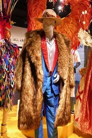 Learn how to make this soaring rocket costume. Elton John Goodbye Yellow Brick Road Rocketman Costume Elton John Costume Elton John Movies Outfit