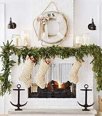 To create the wreath, use the ruler to measure the wreath form into four equal sections and mark with a pencil. Wall Decor Ideas With Nautical Life Preserver Rings Coastal Decor Ideas Interior Design Diy Shopping