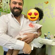 This Foto has made my day, 11 months old baby presented with life  threatening neck abscess. Surgery done with quick recovery. She gave me a  worm hug after the surgery as a