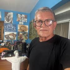 Patti Smith and Bob Dylan outside The Bitter End in Greenwich Village,  1975. Photo by Chuck Pulin