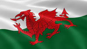 The flag of wales (y ddraig goch, meaning 'the red dragon') consists of a red dragon passant on a green and white field. Shutterstock