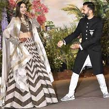 Vogue magazine did the shoot for the wedding, which they brought out in their latest edition. Anand Ahuja Wore Sneakers What Did You Wear To Your Wedding Rediff Com Get Ahead