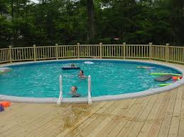 Deck Railings Around Above Ground Pools Free Standing Pool Deck Not Attached To House Above Ground Pool Decks Pool Deck Plans Building A Deck