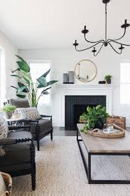 Farmhouse living room decor with a modern fireplace. Modern Farmhouse Living Room Ideas Pickled Barrel