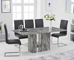This dining table features a natural, white marble table top and a cool table base to go with it. Alicia 180cm Grey Marble Dining Table With Malaga Chairs