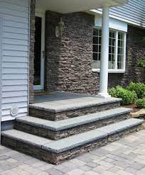 Get the same pots, flowers. Veneer For House Fascia Bluestone Stoop With Rockfaced Treads Front Porch Steps Front Porch Stone House Front