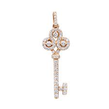The concept of the key pendant evolved from the beauty of antique keys featuring ornate scroll work. Luxurman Womens Diamond Pendants Diamond Key Pendant In 18k Gold 0 85ct 100452