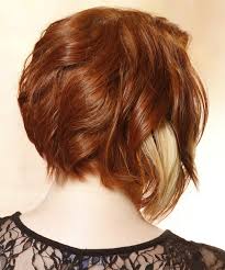 The possibilities for this hairstyle are almost endless. Medium Straight Layered Copper Red Bob Haircut With Side Swept Bangs And Light Blonde Highlights