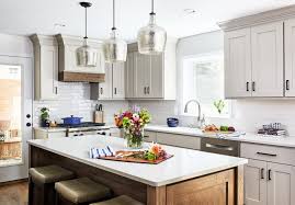 A dark wood cabinetry kitchen cabinets with an enormous amount of viscount white countertop and backsplash with gray veining. 34 Trends That Will Define Home Design In 2020 Jennifer Rosdail San Francisco Real Estate