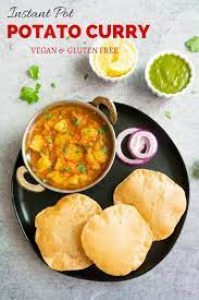 Easy And Comforting Vegan Potato Curry In Tomato Gravy Made In The Instant Pot This North Curry Recipes Vegetarian Instant Pot Indian Food Recipes Vegetarian