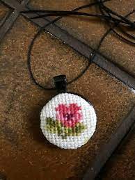 Hand Made Cross Stitch Flower Necklace With Round Black Frame Etsy Cross Stitch Cross Stitch Necklace Stitch