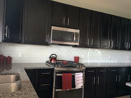 White Glass Subway Tile Backsplash With Dark Cabinets Trendy Kitchen Backsplash White Subway Tile Backsplash
