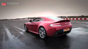 Image result for Magma Red 2011 Aston Martin