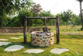 Wells tapping ground water resources can provide drinking water of the highest quality. Old Countryside Water Well With Pulley And Bucket Stock Photo Picture And Royalty Free Image Image 56302381