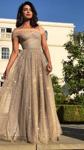 Priyanka Chopra In Christian Dior Attends The Wedding Reception Of Prince Harry And Meghan Markle In London Best Priyanka Chopra Wedding Gowns Bridal Outfits
