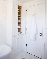 Making Every Inch Count We Designed This Floor To Ceiling Linen Cabinet To Sit I Inexpensive Bathroom Remodel Bathroom Cabinets Designs Bathroom Design Small